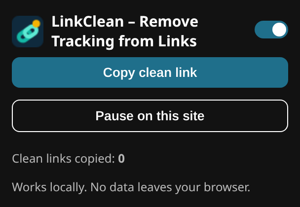 LinkClean popup in dark mode with switch, “Copy clean link” and “Pause on this site”